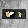 Atlantic Cod in 50g portion on slate with lemon slices and herbs (flatlay) in Singapore