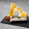 Shrimp Paste with Fish Roe displayed on slate with lemon slice and packaging at background in Singapore.